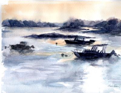 Boats in setting sun